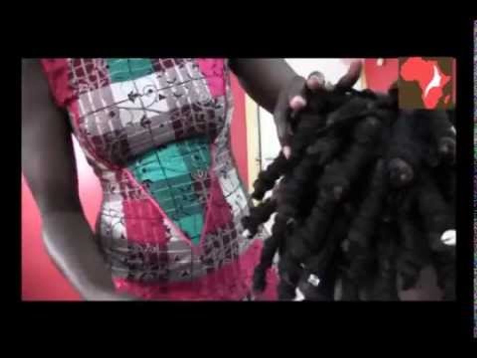 Coiffage de dreadlocks chez Feymie's