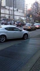 Driver and cyclist fight in Downtown Vancouver street