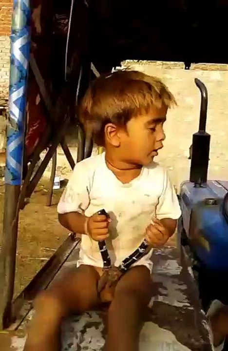 kid use plaier for checking his own parts. funny clip