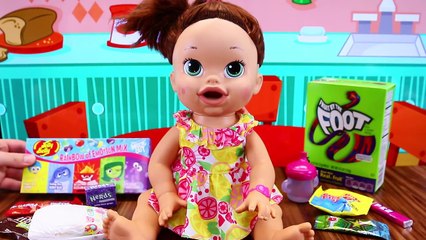 BABY ALIVE Candy Eating Challenge Doll vs Food + M&Ms, Fruit by The Foot, Jelly Belly, Pez