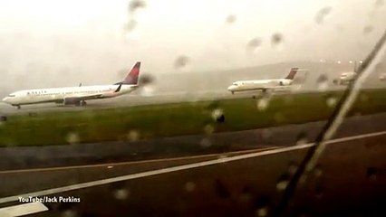 Shocking moment lightning bolt strikes plane on runway