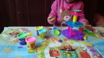 play doh 6-year-old kid doing figures tower of cupcakes