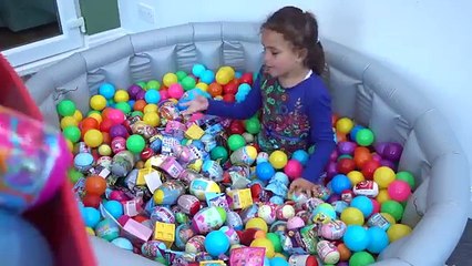 Surprise Eggs Giant Pool full of Kinder Surprise Toys Disney Eggs Mashems Fashems and Shopkins