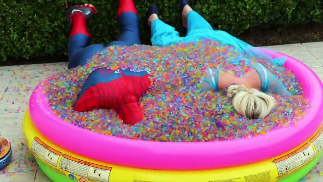 Frozen Elsa & Spiderman Buried Head in Orbeez sand surprise vs Joker Pranks Fun Superhero Real Life Nwprb-JQFg