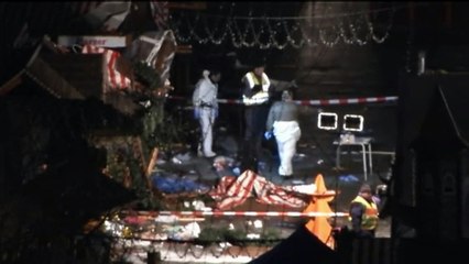 Après le "probable attentat" à Berlin, l'enquête commence et les premiers hommages fleurissent