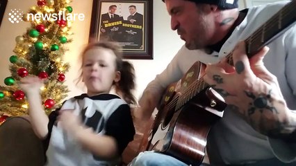 Father and daughter sing 'grunge' version of Christmas song