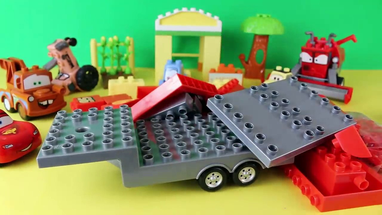 Disney Cars Mega Bloks Lightning McQueen Toy with Mack Truck and Duplo Lego Mater in Tractor Tipping