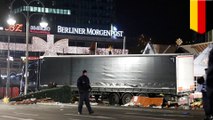 Truck plows into crowded Berlin Christmas market, killing at least 9 people and injuring 50