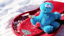 Cookie Monster Driving a Sled Crashing Falling Cookie Monster Sledding Too Icy for Cozy Coupe