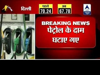 Télécharger la video: Petrol prices slashed by Rs 2.46 per litre from midnight