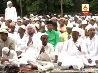 people cutting across age gathers in calcutta for eid prayer.