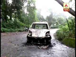A car set on fire by miscreants at chitra in kalimpong.