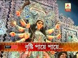 People in kolkata defy rain to throng puja pandals on navami evening.