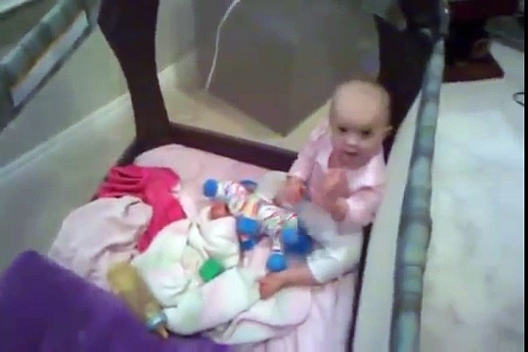 Super cute 1 year-old baby talks her way out of a nap