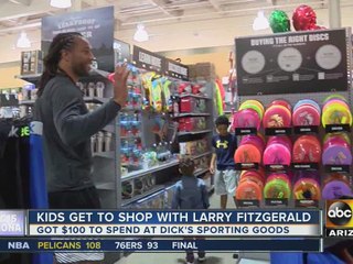 Arizona Cardinals’ Larry Fitzgerald gives kids shopping spree