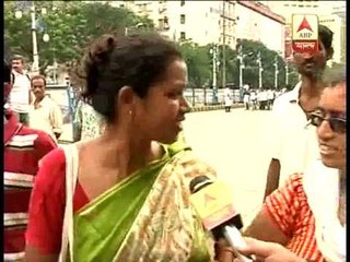 A participant in tmc rally protests the police attack on students, others unaware of the cause!