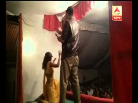 police makes dancer to dance in gunpoint