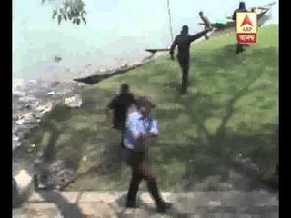 Police lathicharge to disperse outsiders from a booth of Garulia during repoll