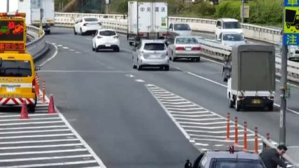 The Japanese Prime Minister's Motorcade merges into traffic