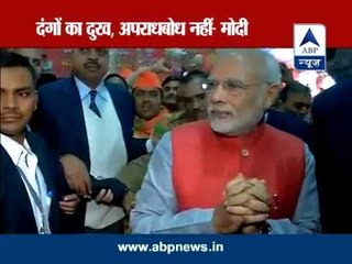 Sad about 2002 riots but not guilty, wanted to quit: Modi in biography