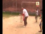 CPM candidate of Singur plays with bat during campaign