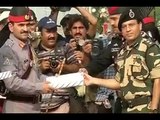 Indian army exchange sweets and gifts with Pakistan at Wagah Border on neighbouring countr