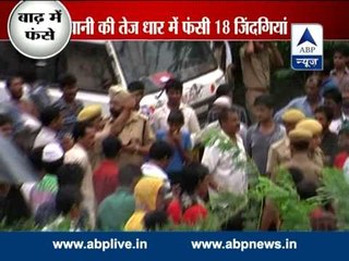 Tonk: 8-10 persons stranded on a truck that is stuck in River Banas