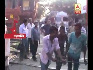 Damaged truck at railway line at Baidyabati, movement of cars on halt Chat Conversation En