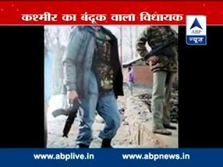 PDP MLA Javed Mustafa campaigns with gun and bulletproof jacket l Causes controversy