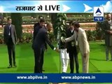 Obama at Raj Ghat: Obama plants Peepal tree sapling I Pays tribute to Mahatma Gandhi