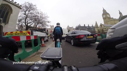 BL04YGV - Swerves at cyclist