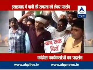 Congress workers protest against insufficient water supply with bangles