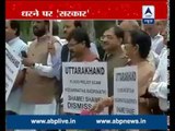 NDA protests inside Parliament premises over scams by Congress