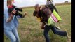 SHOCKING VIDEO: Female photographer kicks a migrant to get her exclusive shot, sacked