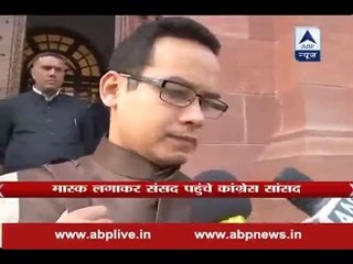 Congress MP Gaurav Gogoi comes to the Parliament in a pollution mask