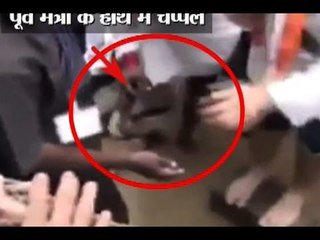 Flattery: Ex-Union Minister holds slippers for Rahul Gandhi in flooded Puducherry