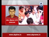 Mahesh Giri sits in protest outside Delhi CM Arvind Kejriwal's home