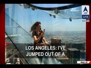 In Graphics: Would you dare to take a glass slide 1000 feet above ground?