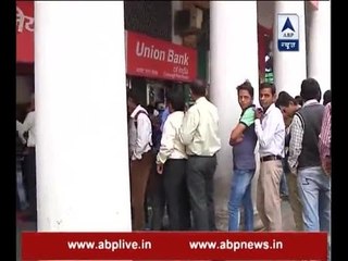 Some ATMs in Delhi start working; people queue up