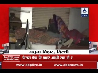 Troubled by cash crisis, people sleep outside bank in Delhi