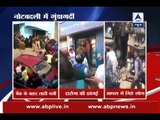 Demonetisation: People bear lathicharge while queuing up outside banks and ATMs