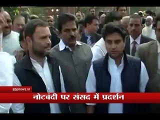 Opposition including DMK, CPM, Congress and RJD protest in front of Gandhi statue in Parli