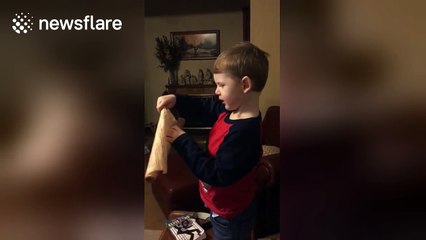 Cancer survivor kid sees his prosthetic eye for the first time