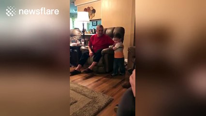 First-born son tries to imitate his mum's pregnant walk