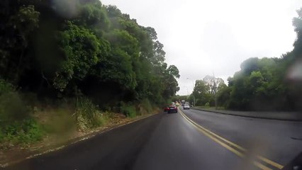 female biker gets knocked down by hit and run driver