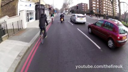 Drives in to cyclist, gets upset when mirror gets folded in...