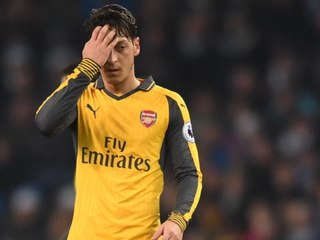 Wenger defends Ozil work ethic