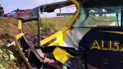 Bus plunges off cliff killing 14 in Malaysia