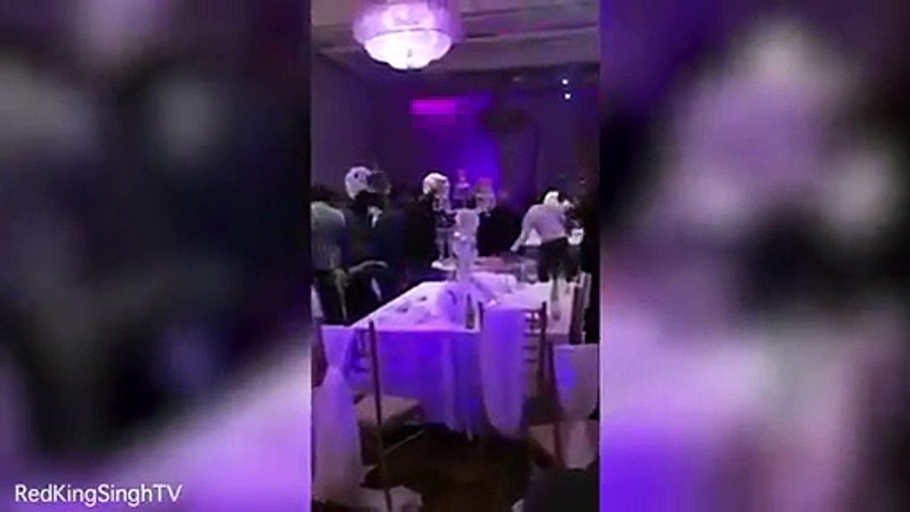 Fight during wedding,Guests throwing chairs