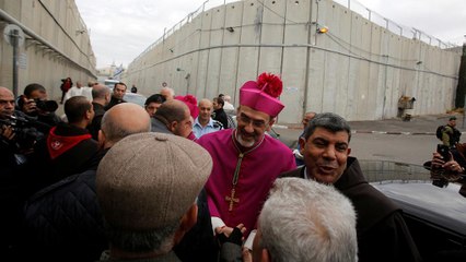 Christmas Eve crowds flock to Bethlehem